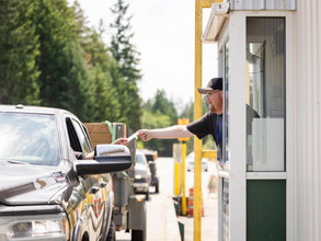 Olympic View Transfer Station Scale House, attendant handing customer information
