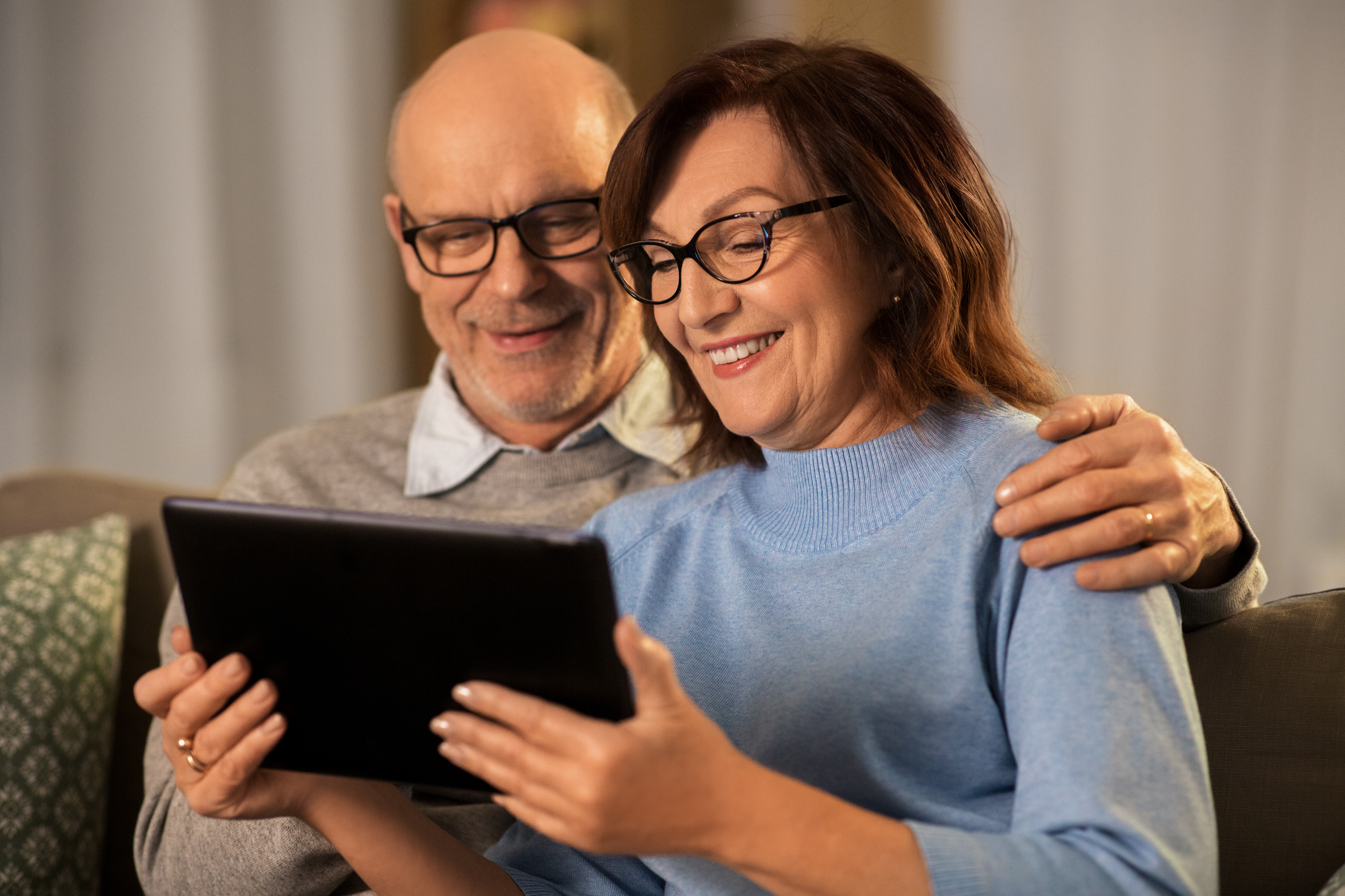 couple viewing tablet