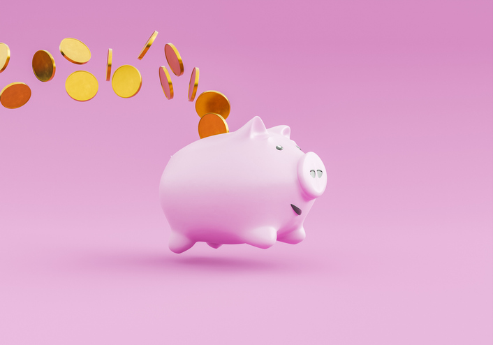 Piggy bank jumping and dropping coins